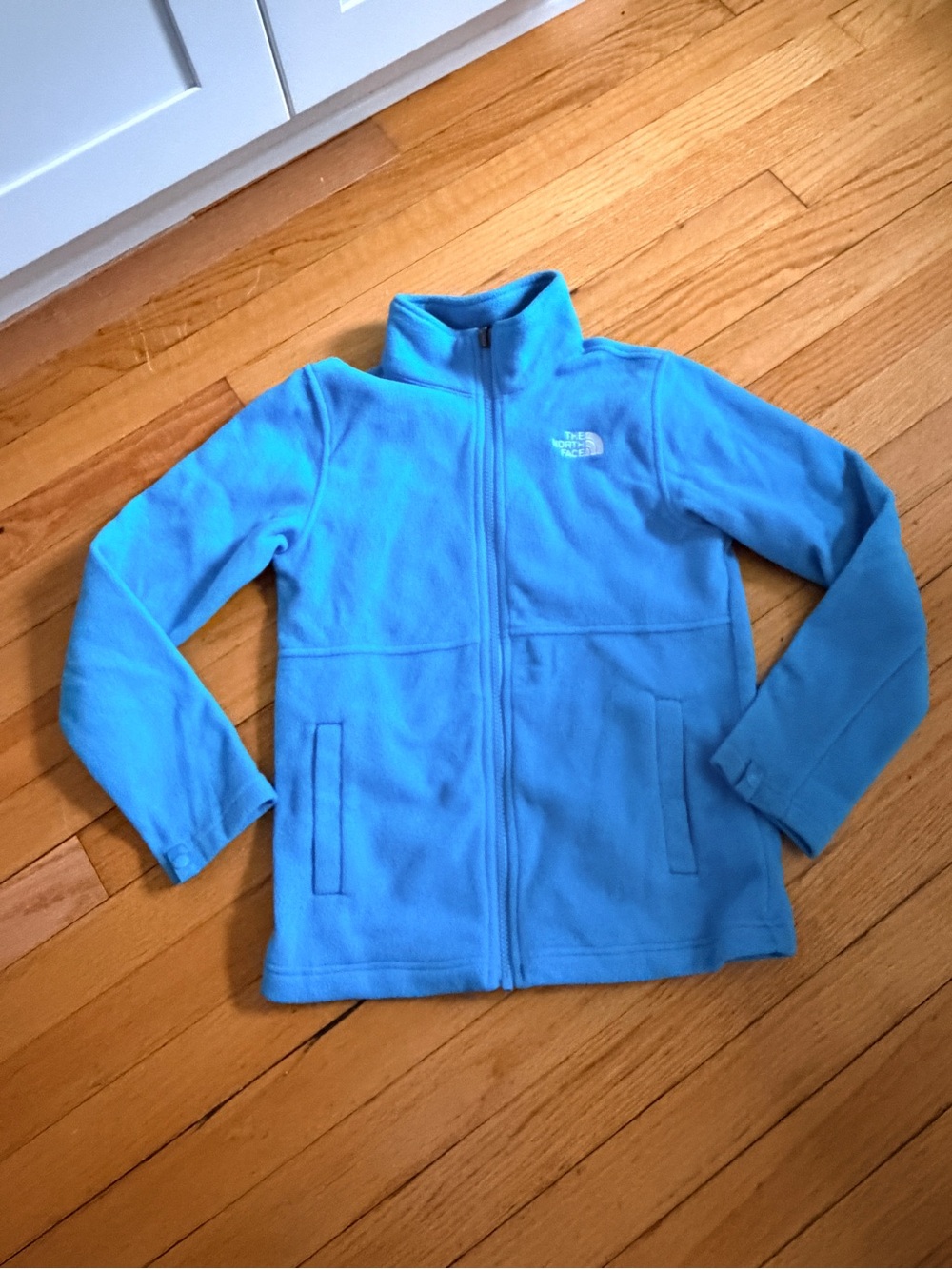 The North Face turquoise Fleece Jacket with White Logo- like new condition